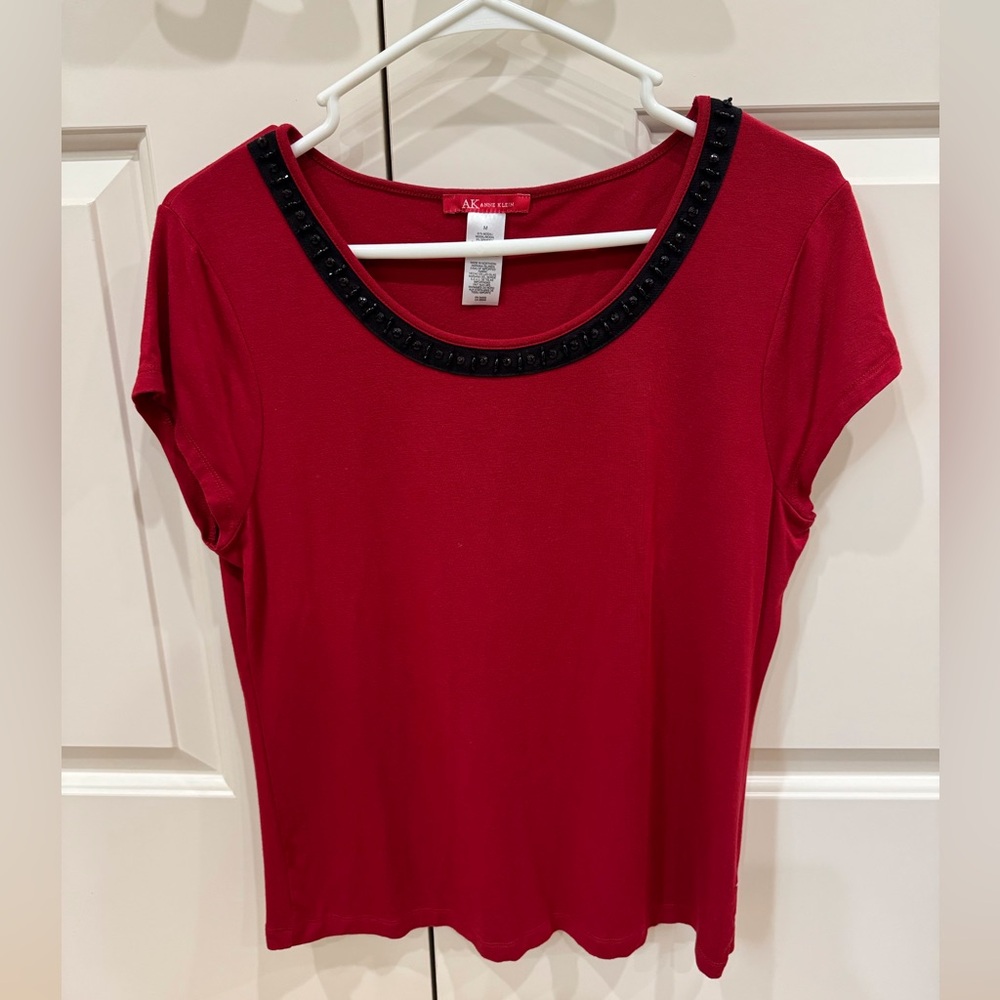 Anne Klein Red top with black beaded neckline. Size M